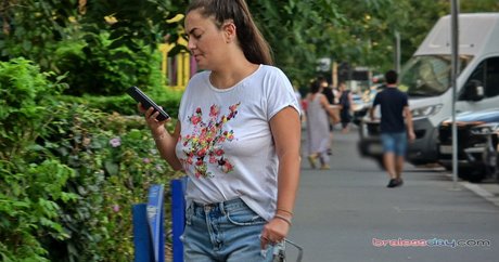 Candid Bralessday photo 15